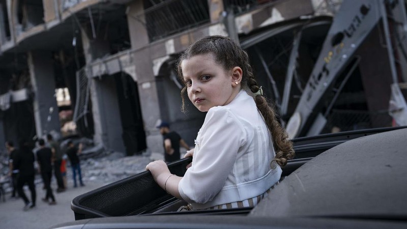 Kesepakatan gencatan senjata mengakhiri aksi saling serang anåtara Israel dan Palestina di jalur Gaza. (AP/John Minchillo)