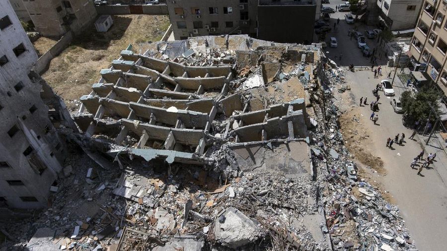 An aerial view of the destroyed building housing the offices of The Associated Press and other media, after it was hit last week by Israeli airstrikes, in Gaza City, Saturday, May 22, 2021.(AP Photo/Khalil Hamra)
