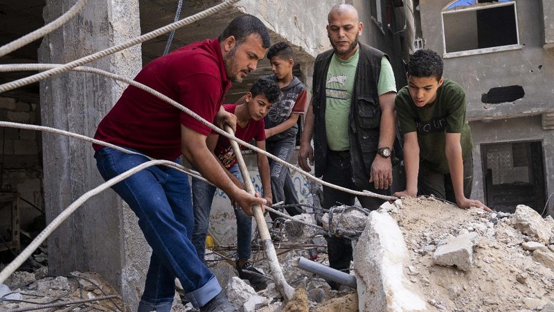 Palestina mulai berbenah pasca konflik dengan Israel. (AP/John Minchillo)