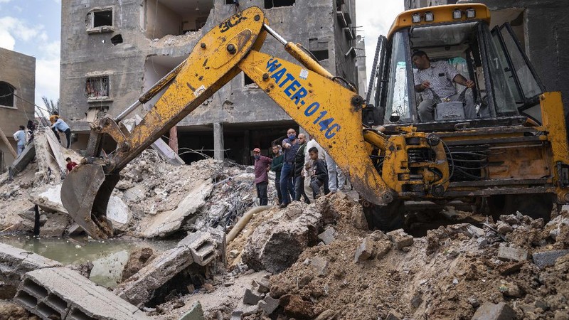Palestina mulai berbenah pasca konflik dengan Israel. (AP/John Minchillo)