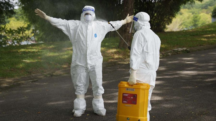Kasus kematian akibat Covid-19 meningkat di Malaysia. (AP/Vincent Thian)