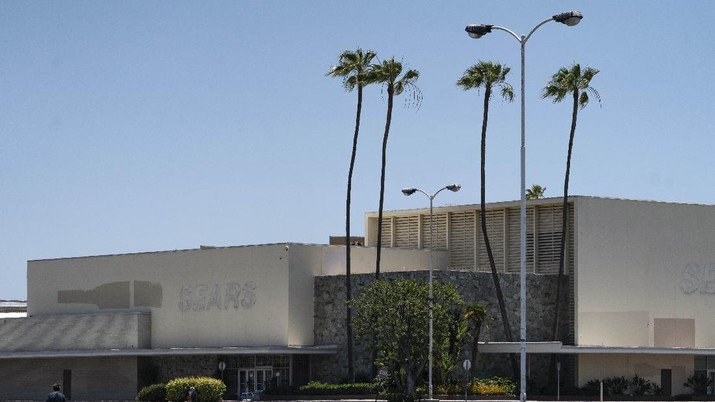 This Thursday, May 27, 2021, photo shows the closed Sears in Buena Park Mall in Buena Park, Calif. California state lawmakers are grappling with a particularly 21st-century problem: What to do with the growing number of shopping malls and big-box retail stores left empty by consumers shifting their purchases to the web. A possible answer in crowded California cities is to build housing on these sites, which already have ample parking and are close to existing neighborhoods. (AP Photo/Damian Dovarganes)