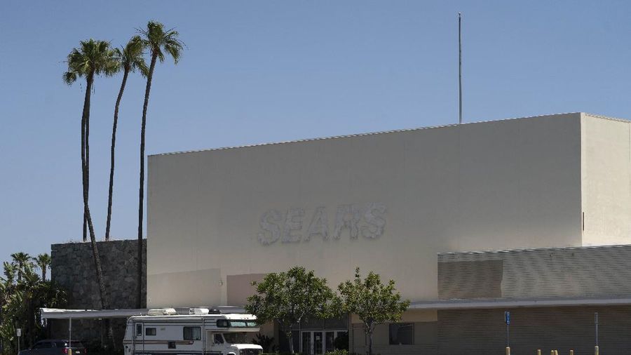 This Thursday, May 27, 2021, photo shows the closed Sears in Buena Park Mall in Buena Park, Calif. California state lawmakers are grappling with a particularly 21st-century problem: What to do with the growing number of shopping malls and big-box retail stores left empty by consumers shifting their purchases to the web. A possible answer in crowded California cities is to build housing on these sites, which already have ample parking and are close to existing neighborhoods. Even before the pandemic, big-box retail stores struggled to adapt as more people began buying things online. In 2019, after purchasing Sears and Kmart, Transformco closed 96 stores across the country, 29 in California. (AP Photo/Damian Dovarganes)