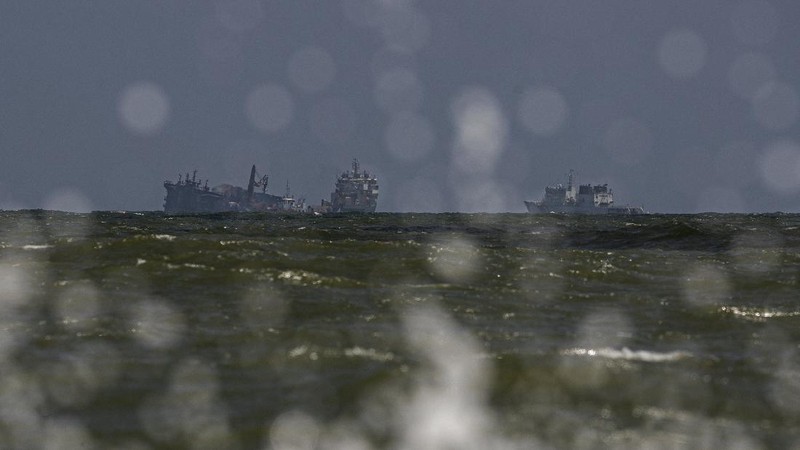 This photo provided by Sri Lankan Air Force shows the sinking MV X-Press Pearl at Kapungoda where it is anchored off Colombo port, Sri Lanka, Wednesday, June 2, 2021. Salvage experts were attempting to tow the fire-stricken container ship that had been loaded with chemicals into the deep sea as the vessel started to sink Wednesday. Water submerged the MV X-Press Pearl's quarterdeck a day after firefighters extinguished a blaze that had been burning for 12 days. (Sri Lanka Air Force via AP)