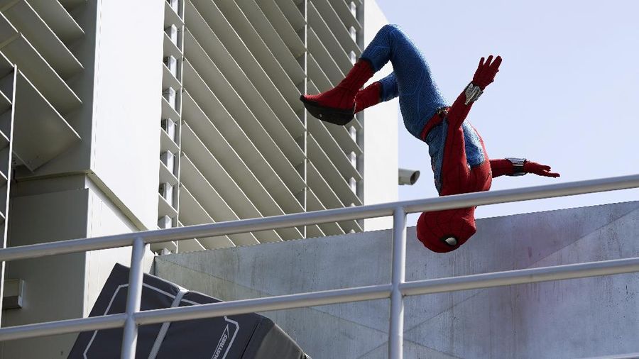 A Spider-Man character performs during 