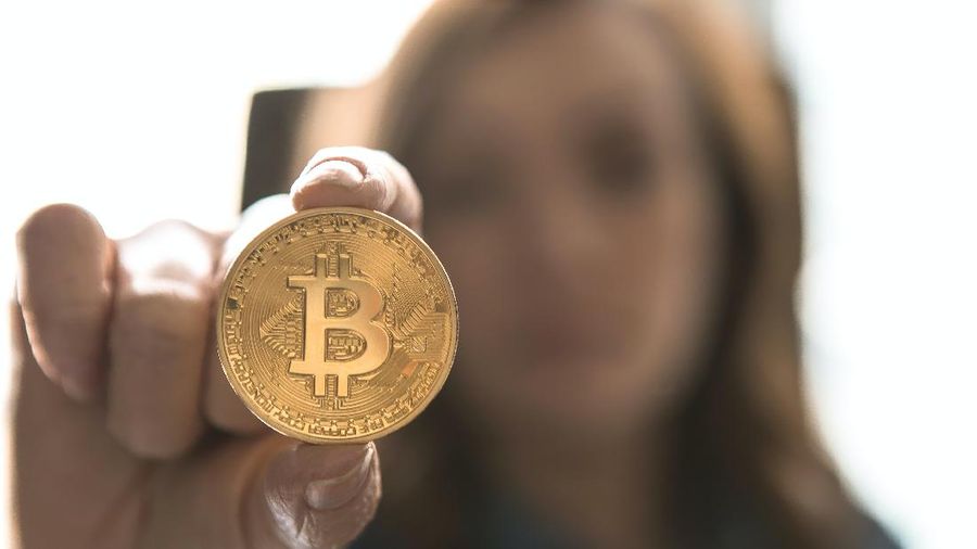 Ilustrasi Bitcoin  (Photo by André François McKenzie on Unsplash)