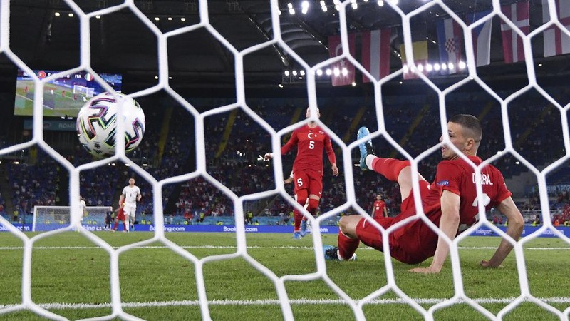 Italy's Ciro Immobile scores his side's second goal during the Euro 2020, soccer championship group A match between Italy and Turkey, at the Rome Olympic stadium, Friday, June 11, 2021. (Alfredo Falcone/LaPresse via AP)