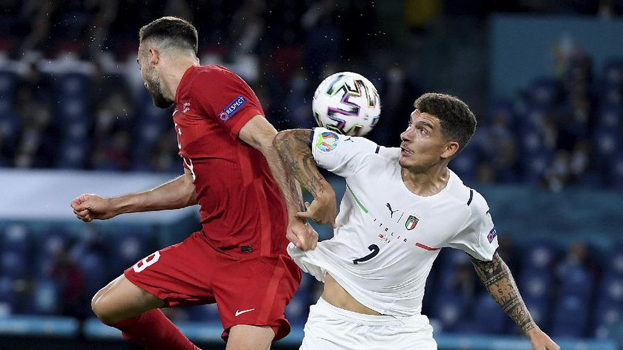 Italy's Ciro Immobile scores his side's second goal during the Euro 2020, soccer championship group A match between Italy and Turkey, at the Rome Olympic stadium, Friday, June 11, 2021. (Alfredo Falcone/LaPresse via AP)