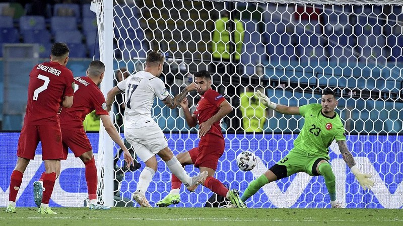 Italy's Ciro Immobile scores his side's second goal during the Euro 2020, soccer championship group A match between Italy and Turkey, at the Rome Olympic stadium, Friday, June 11, 2021. (Alfredo Falcone/LaPresse via AP)