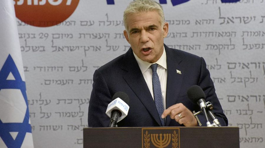 Chairman of the Yesh Atid Party, Yair Lapid, delivers a statement to the press in the Knesset, the Israeli Parliament, in Jerusalem, on Monday, May 31, 2021. (Debbie Hill/Pool via AP)