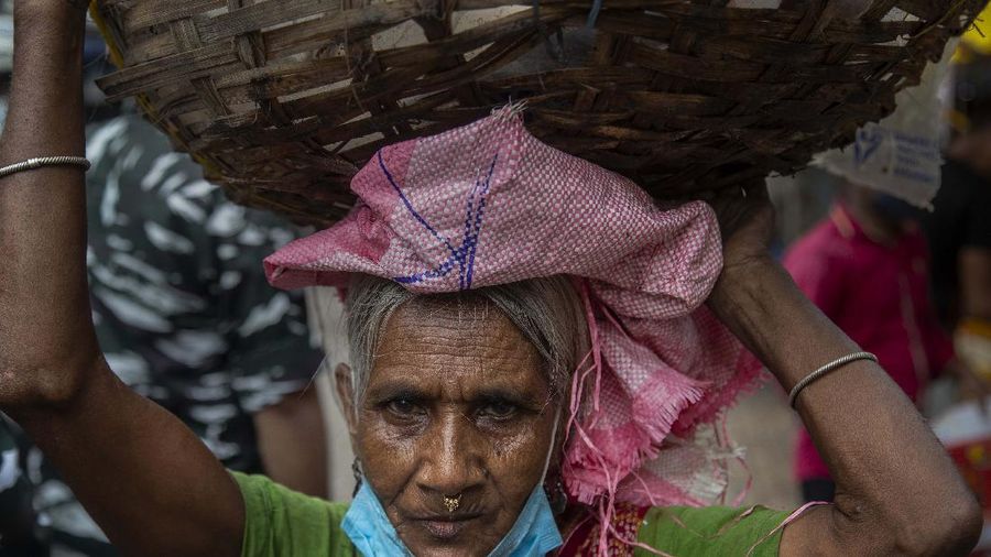 Pelonggaran lockdown di India. (AP/Channi Anand)