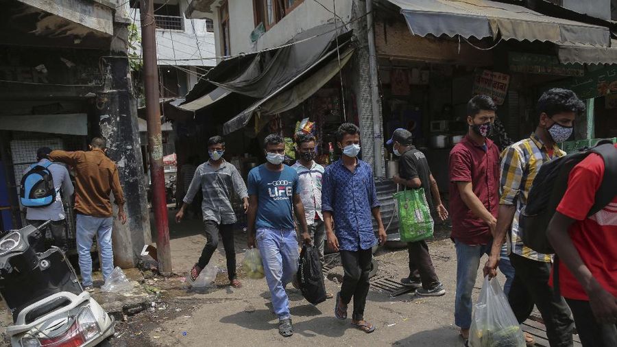 Pelonggaran lockdown di India. (AP/Channi Anand)