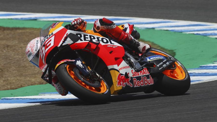 Spain's Marc Marquez of Repsol Honda Team, speeds at a free training session of the MotoGP in Hohenstein-Ernstthal, Germany, Friday, June 18, 2021. (Jan Woitas/dpa via AP)