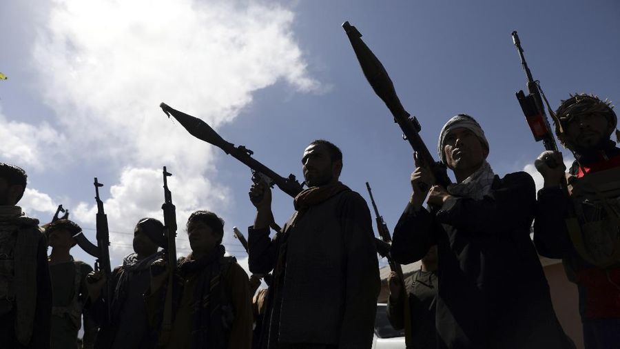 Afghan militiamen join Afghan defense and security forces during a gathering in Kabul, Afghanistan, Wednesday, June 23, 2021. Taliban gains in north Afghanistan, the traditional stronghold of the country's minority ethnic groups who drove the insurgent force from power nearly 20  years ago, has driven a worried government to resurrect militias whose histories have been characterized by chaos and widespread killing. (AP Photo/Rahmat Gul)