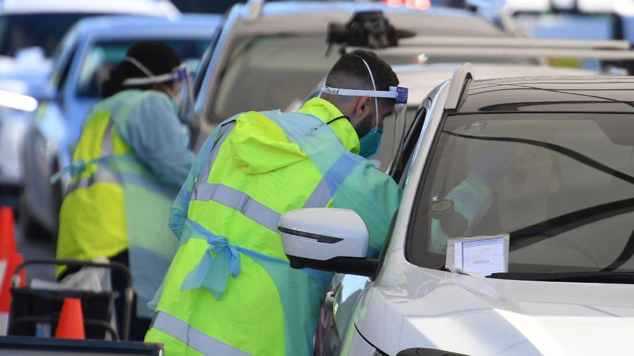 People queue in their cars to get tested for COVID-19 at a pop-up testing clinic at Bondi Beach in Sydney Friday, June 25, 2021. Parts of Sydney will go into lockdown late Friday after a coronavirus outbreak in Australia’s largest city continued to grow. (Dean Lewins/AAP Image via AP)