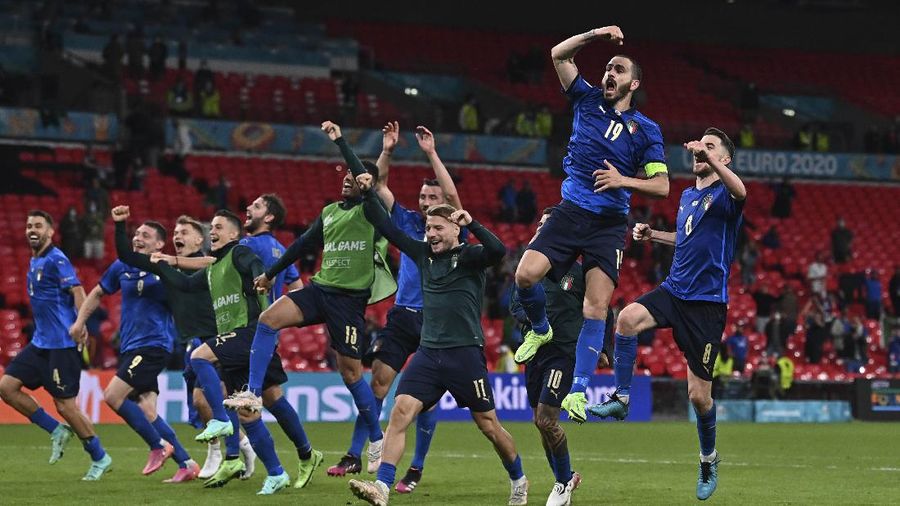 Denmark's Martin Braithwaite, centre, makes an attempt to score during the Euro 2020 soccer championship round of 16 match between Wales and Denmark at Johan Cruyff ArenA in Amsterdam, Netherlands, Saturday, June 26, 2021. (Olaf Kraak/Pool via AP)