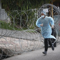 Sederet Alasan Kenapa Malaysia Alami 'Tsunami' Covid-19