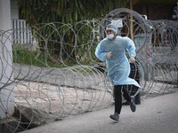 Sederet Alasan Kenapa Malaysia Alami 'Tsunami' Covid-19