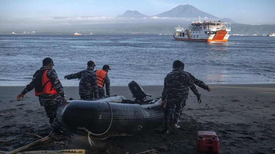 Indonesian Navy personnel prepare for a search rescue operation for victims of the sinking ferry KMP Yunice near Gilimanuk Port on Bali Island, Indonesia, Wednesday, June 30, 2021. Rescuers on Wednesday were searching for people missing in rough seas overnight. (AP Photo/Fauzy Chaniago)