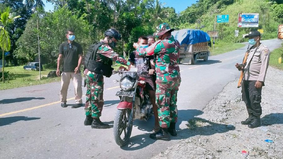 Satgas Yonif 512/QY Tekan Angka penyebaran Covid-19 Di Tapal Batas Papua.