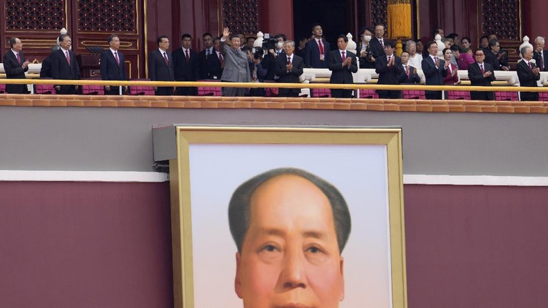 A screen shows Chinese President Xi Jinping speak during a ceremony to mark the 100th anniversary of the founding of the ruling Chinese Communist Party at Tiananmen Square in Beijing Thursday, July 1, 2021. (AP Photo/Ng Han Guan)