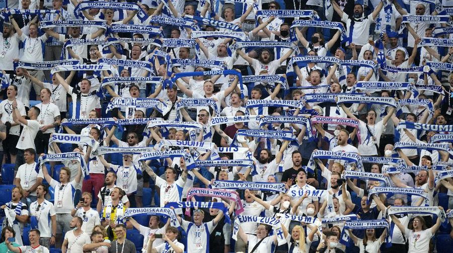 England fans celebrate during the Euro 2020 soccer championship round of 16 match between England and Germany at Wembley Stadium in England, Tuesday June 29, 2021. (Justin Tallis, Pool Photo via AP)