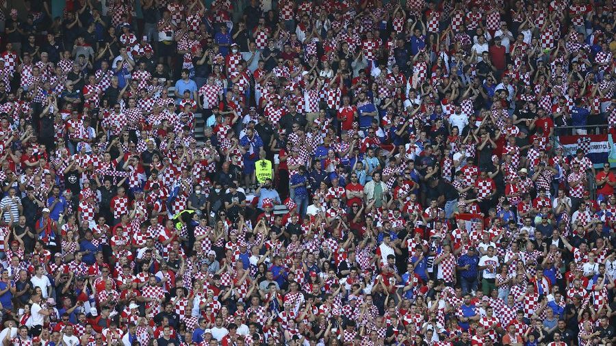 Fans of Croatia are seen during the Euro 2020 soccer championship round of 16 match between Croatia and Spain, at Parken stadium in Copenhagen, Denmark, Monday, June 28, 2021. (Wolfgang Rattay, Pool via AP)