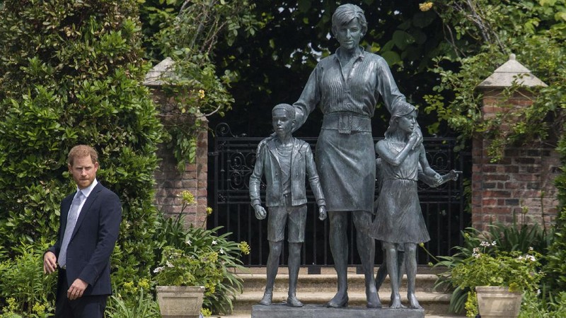 Britain's Prince William and Prince Harry arrive for the statue unveiling on what woud have been Princess Diana's 60th birthday, in the Sunken Garden at Kensington Palace, London, Thursday July 1, 2021. (Yui Mok/Pool Photo via AP)