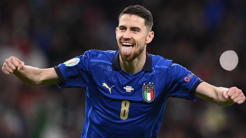 Italy's Federico Chiesa, right, scores the opening goal during the Euro 2020 soccer championship semifinal match between Italy and Spain at Wembley stadium in London, Tuesday, July 6, 2021. (Facundo Arrizabalaga/Pool Photo via AP)