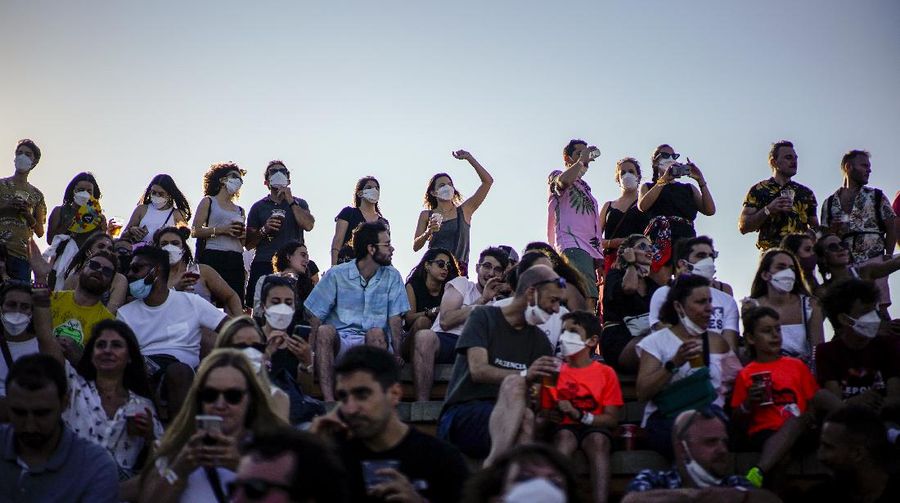 People attend the Cruilla music festival in Barcelona, Spain, Friday, July 9, 2021. (AP Photo/Joan Mateu)