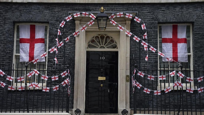 A view of 10 Downing Street, the official residence of Britain's Prime Minister Boris Johnson, decorated with England flag bunting, ahead of the Euro 2020 soccer championship final match between England and Italy   on Sunday, in London, Friday, July 9, 2021. (Aaron Chown/PA via AP)