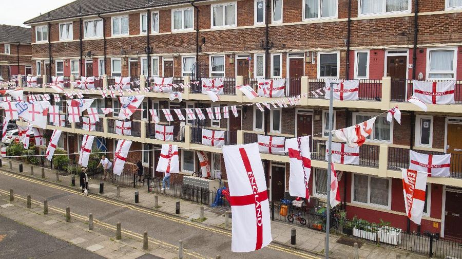 A view of 10 Downing Street, the official residence of Britain's Prime Minister Boris Johnson, decorated with England flag bunting, ahead of the Euro 2020 soccer championship final match between England and Italy   on Sunday, in London, Friday, July 9, 2021. (Aaron Chown/PA via AP)