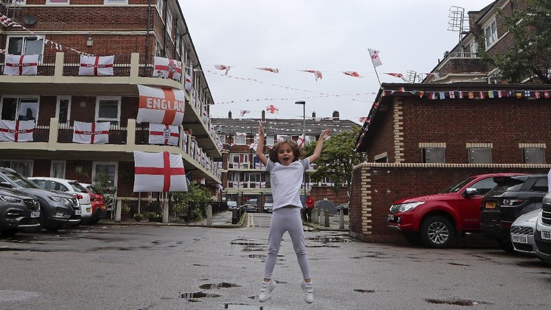 A view of 10 Downing Street, the official residence of Britain's Prime Minister Boris Johnson, decorated with England flag bunting, ahead of the Euro 2020 soccer championship final match between England and Italy   on Sunday, in London, Friday, July 9, 2021. (Aaron Chown/PA via AP)