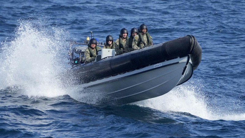 US Navy sailor of destroyer USS Ross Davonne Chestnut from Phoenix, Arizona, left, practices hand-to-hand combat during Sea Breeze 2021 maneuvers,  in the Black Sea, Wednesday, July 7, 2021. Ukraine and NATO have conducted Black Sea drills involving dozens of warships in a show of strong defense ties amid the heightened tensions in the wake of last month's incident with a British destroyer off Crimea. (AP Photo/Efrem Lukatsky)