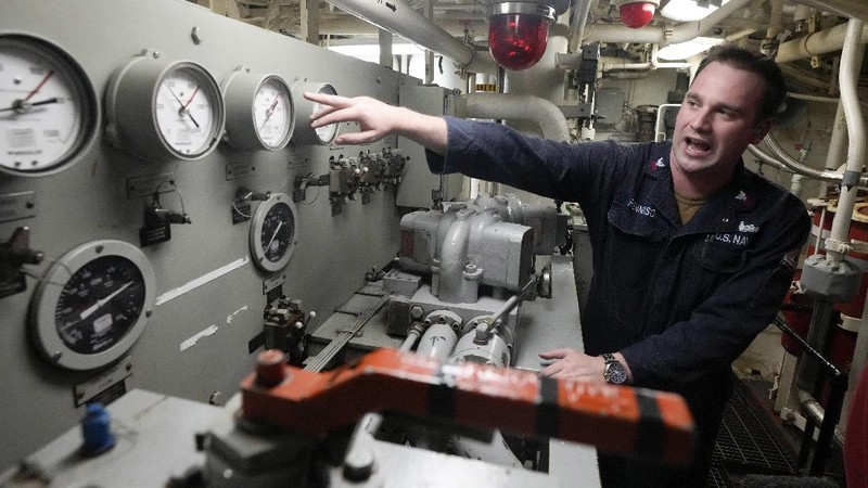 US Navy sailor of destroyer USS Ross Davonne Chestnut from Phoenix, Arizona, left, practices hand-to-hand combat during Sea Breeze 2021 maneuvers,  in the Black Sea, Wednesday, July 7, 2021. Ukraine and NATO have conducted Black Sea drills involving dozens of warships in a show of strong defense ties amid the heightened tensions in the wake of last month's incident with a British destroyer off Crimea. (AP Photo/Efrem Lukatsky)