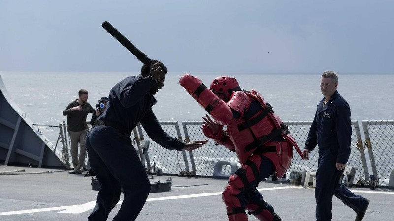 US Navy sailor of destroyer USS Ross Davonne Chestnut from Phoenix, Arizona, left, practices hand-to-hand combat during Sea Breeze 2021 maneuvers,  in the Black Sea, Wednesday, July 7, 2021. Ukraine and NATO have conducted Black Sea drills involving dozens of warships in a show of strong defense ties amid the heightened tensions in the wake of last month's incident with a British destroyer off Crimea. (AP Photo/Efrem Lukatsky)