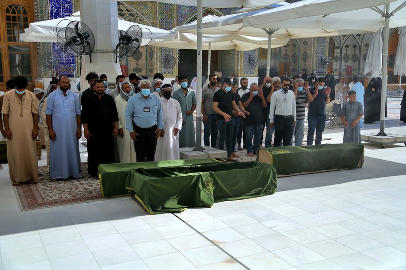 Iraq Hospital Fire People gather outside a COVID-19 hospital in Nasiriyah, Iraq, early Tuesday, July 13, 2021. A catastrophic blaze erupted at the coronavirus hospital ward. It was the second time a large fire killed coronavirus patients in an Iraqi hospital this year. (AP Photo)