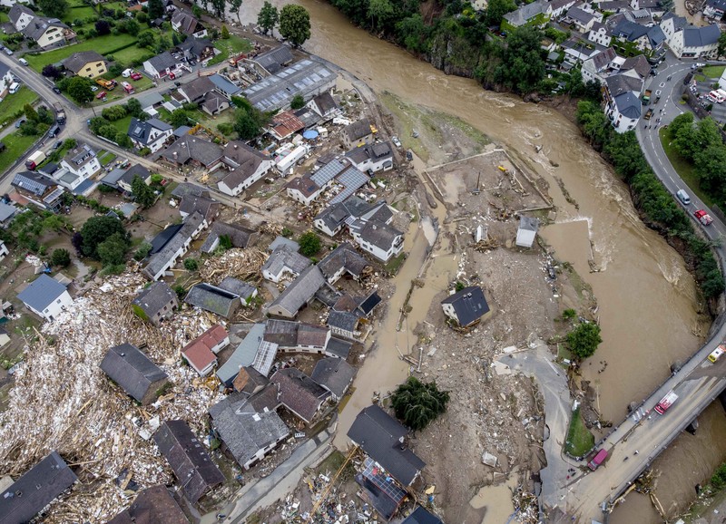 APTOPIX Germany Europe Weather Destroyed houses are seen close to the Ahr river in Schuld, Germany, Thursday, July 15, 2021. Due to heavy rain falls the Ahr river dramatically went over the banks the evening before. People have died and dozens of people are missing in Germany after heavy flooding turned streams and streets into raging torrents, sweeping away cars and causing some buildings to collapse. (AP Photo/Michael Probst)