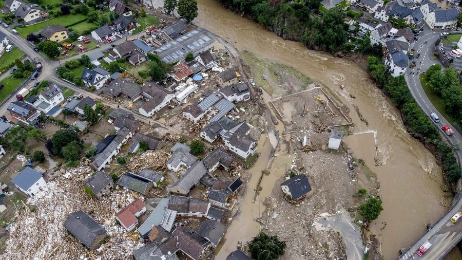 Destroyed houses are seen close to the Ahr river in Schuld, Germany, Thursday, July 15, 2021. Due to heavy rain falls the Ahr river dramatically went over the banks the evening before. People have died and dozens of people are missing in Germany after heavy flooding turned streams and streets into raging torrents, sweeping away cars and causing some buildings to collapse. (AP Photo/Michael Probst)