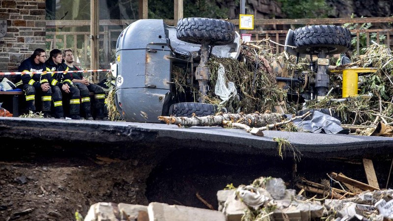 Destroyed houses are seen close to the Ahr river in Schuld, Germany, Thursday, July 15, 2021. Due to heavy rain falls the Ahr river dramatically went over the banks the evening before. People have died and dozens of people are missing in Germany after heavy flooding turned streams and streets into raging torrents, sweeping away cars and causing some buildings to collapse. (AP Photo/Michael Probst)