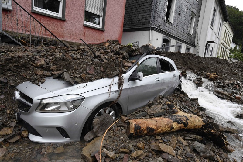 APTOPIX Germany Europe Weather Destroyed houses are seen close to the Ahr river in Schuld, Germany, Thursday, July 15, 2021. Due to heavy rain falls the Ahr river dramatically went over the banks the evening before. People have died and dozens of people are missing in Germany after heavy flooding turned streams and streets into raging torrents, sweeping away cars and causing some buildings to collapse. (AP Photo/Michael Probst)