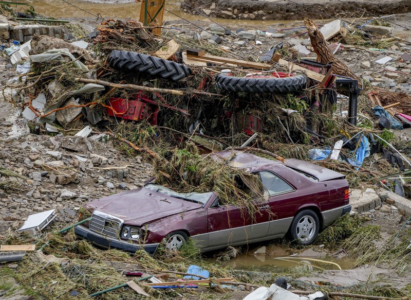 Destroyed houses are seen close to the Ahr river in Schuld, Germany, Thursday, July 15, 2021. Due to heavy rain falls the Ahr river dramatically went over the banks the evening before. People have died and dozens of people are missing in Germany after heavy flooding turned streams and streets into raging torrents, sweeping away cars and causing some buildings to collapse. (AP Photo/Michael Probst)