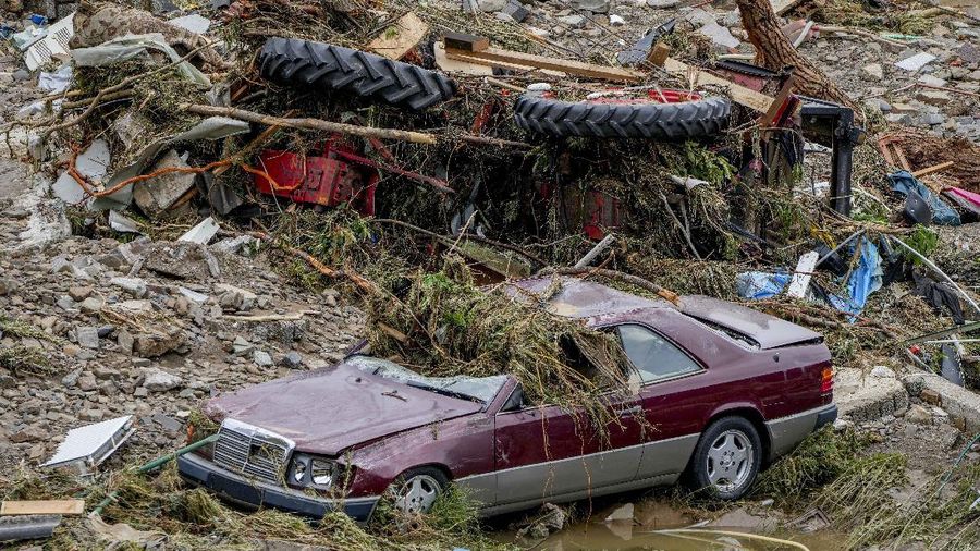 Destroyed houses are seen close to the Ahr river in Schuld, Germany, Thursday, July 15, 2021. Due to heavy rain falls the Ahr river dramatically went over the banks the evening before. People have died and dozens of people are missing in Germany after heavy flooding turned streams and streets into raging torrents, sweeping away cars and causing some buildings to collapse. (AP Photo/Michael Probst)