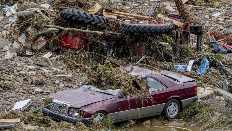 Destroyed houses are seen close to the Ahr river in Schuld, Germany, Thursday, July 15, 2021. Due to heavy rain falls the Ahr river dramatically went over the banks the evening before. People have died and dozens of people are missing in Germany after heavy flooding turned streams and streets into raging torrents, sweeping away cars and causing some buildings to collapse. (AP Photo/Michael Probst)