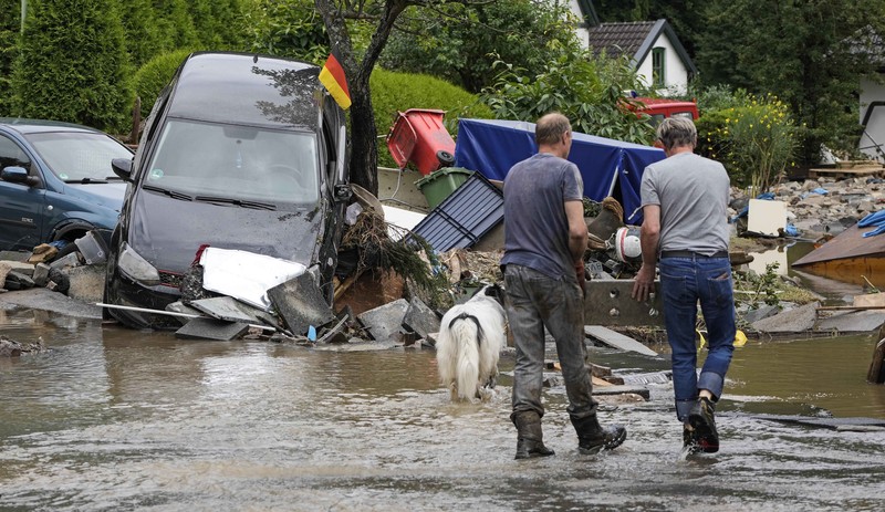 Destroyed houses are seen close to the Ahr river in Schuld, Germany, Thursday, July 15, 2021. Due to heavy rain falls the Ahr river dramatically went over the banks the evening before. People have died and dozens of people are missing in Germany after heavy flooding turned streams and streets into raging torrents, sweeping away cars and causing some buildings to collapse. (AP Photo/Michael Probst)