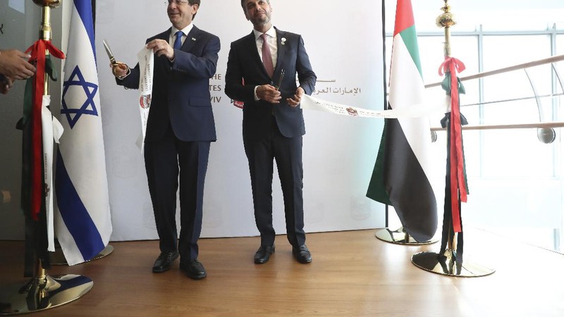 A United Arab Emirates guard stands during the opening ceremony for the new UAE embassy, in Tel Aviv, Israel, Wednesday, July 14, 2021. The UAE formally opened its embassy less than a year after the two countries announced they would establish open relations. (AP Photo/Ariel Schalit)