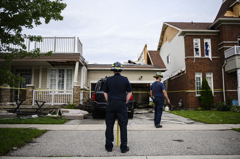 Canada Barrie Tornado Damage left after a tornado touched down in a neighborhood of Barrie, Ontario, on Thursday, July 15, 2021. (Christopher Katsarov/The Canadian Press via AP)