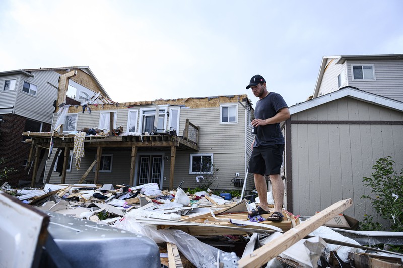 Canada Barrie Tornado Damage left after a tornado touched down in a neighborhood of Barrie, Ontario, on Thursday, July 15, 2021. (Christopher Katsarov/The Canadian Press via AP)