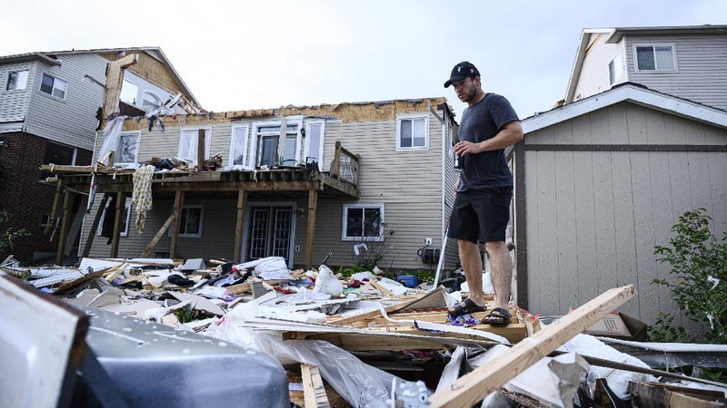 Damage left after a tornado touched down in a neighborhood of Barrie, Ontario, on Thursday, July 15, 2021. (Christopher Katsarov/The Canadian Press via AP)