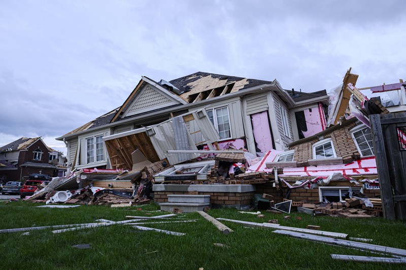 Canada Barrie Tornado Damage left after a tornado touched down in a neighborhood of Barrie, Ontario, on Thursday, July 15, 2021. (Christopher Katsarov/The Canadian Press via AP)